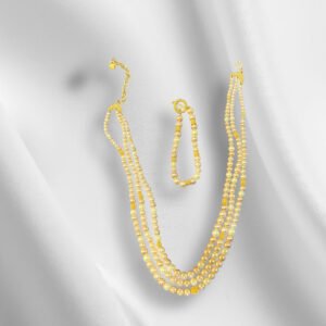 Gold Toned Pearl and Gold Bracelet and Necklace Set